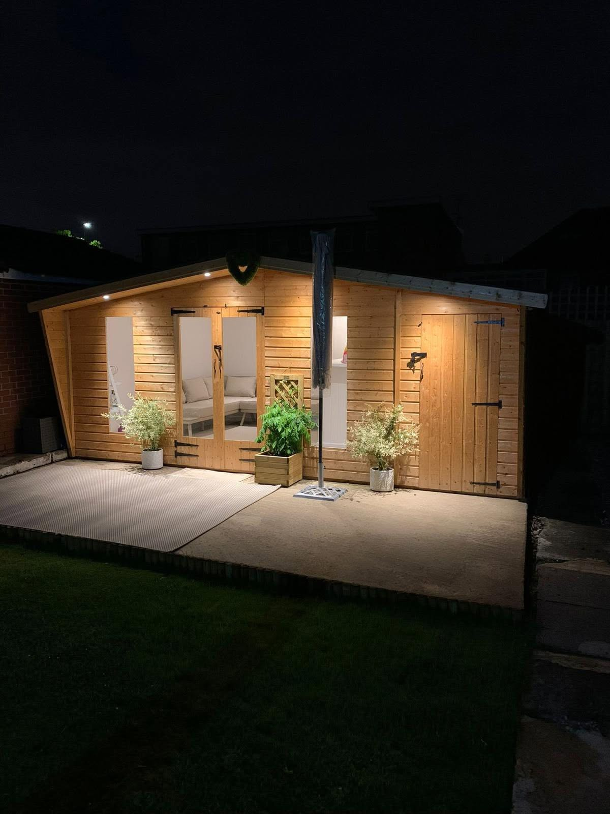 Outdoor garden room lit by downlights installed by T.D Electrical & Building Services